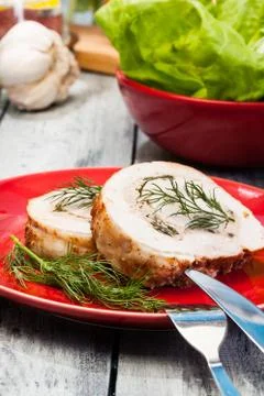Sliced pork lion roll stuffed with mushrooms on a plate Stock Photos