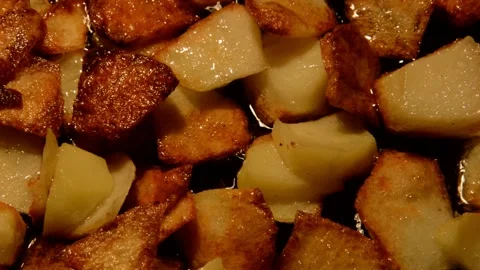 Sliced potato are fried Stock Footage 271715443