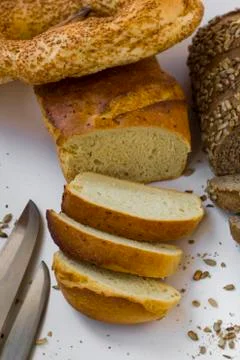 Sliced potato bread on white background Stock Photos