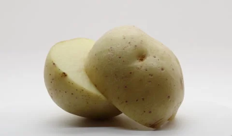 Sliced Potato Rotating Stock Footage 230746697