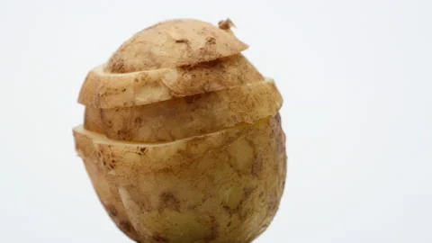 Sliced potato on a white Stock Footage 162644314