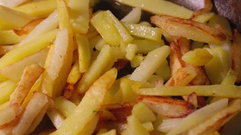 Sliced Potatoes Being Pan Fried in Oil as French Fries 4K Vídeo Stock 332158718