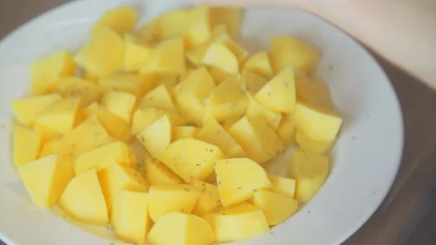 Sliced potatoes on the plate 스톡 동영상 103941826
