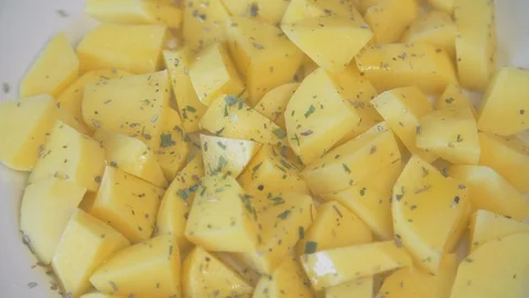 Sliced potatoes on the plate 動画素材 103944385
