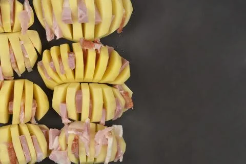 Sliced Potatoes Stuffed with Bacon Stock Photos