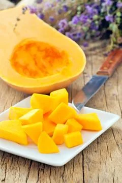 Sliced pumpkin on plate Stock Photos