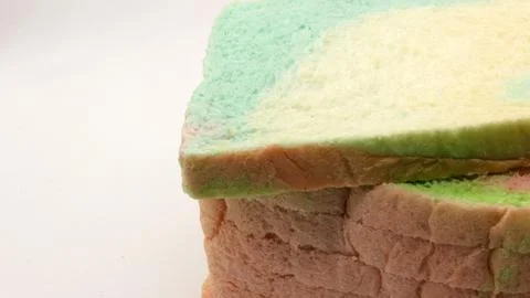 Sliced rainbow bread isolated Stock Photos