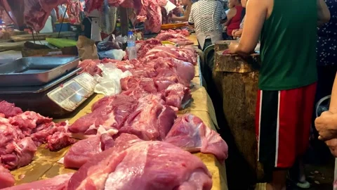 Sliced Raw Pork Meat on Table at Local Wet Market in the Philippines - Stock Footage 139333075