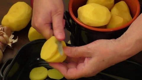 Sliced raw potatoes –cooking Stock Footage 70961208