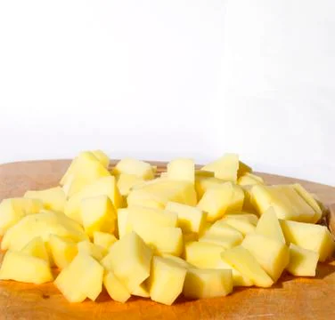 Sliced raw potatoes Stock Photos