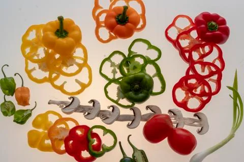 Sliced raw vegetables on white background Stock Photos