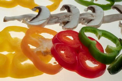 Sliced raw vegetables on white background Stock Photos