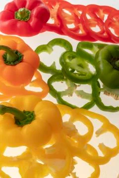 Sliced raw vegetables on white background Stock Photos