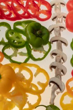 Sliced raw vegetables on white background Stock Photos