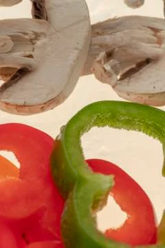 Sliced raw vegetables on white background Stock Photos