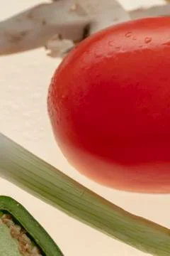 Sliced raw vegetables on white background Stock Photos