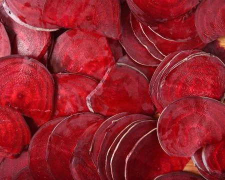 Sliced red beets background Stock Photos