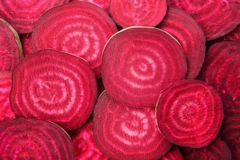 Sliced red beets as background, top view Stock Photos