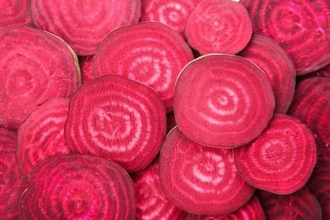Sliced red beets as background, top view Stock Photos