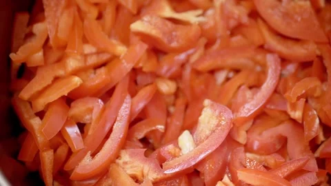 Sliced Red Bell Peppers Piled In Pot With Vibrant Fresh Texture 库存影片 330119324