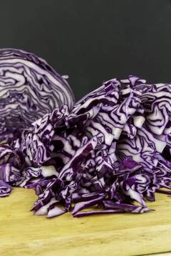 Sliced red cabbage on chopping  board. Stock Photos
