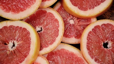 Sliced red grapefruit Stock Footage 103111428
