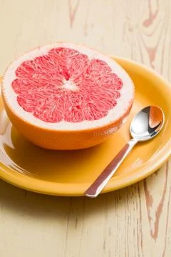 Sliced red grapefruit Stock Photos