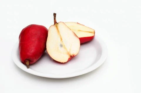 Sliced red pear Stock Photos