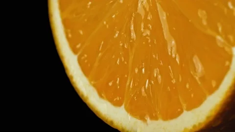 Sliced ripe orange in 4k Stock Footage 144992807