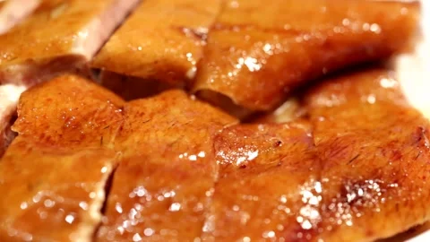 Sliced roast goose placed on a rotating plate, macro close-up3 Stock Footage 236529038