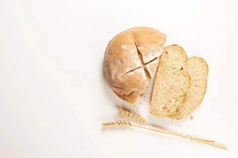 Sliced round wheat bread loaf with grains Stock Photos