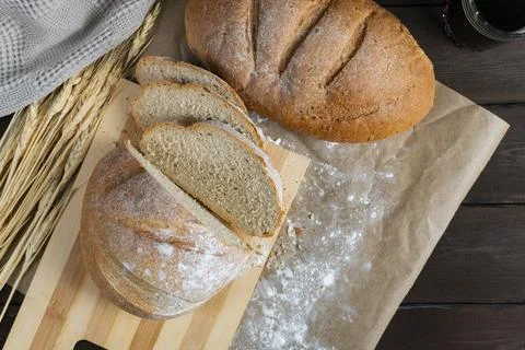Sliced Rustic Bread with Wheat Stock-Fotos
