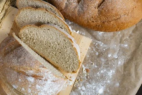 Sliced Rustic Bread with Wheat Stock Photos