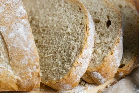 Sliced Rustic Bread with Wheat Stock Photos