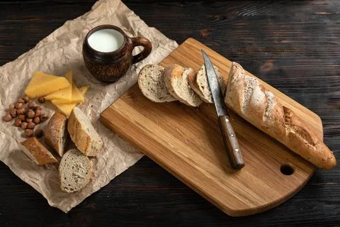 Sliced rye bread on a cutting board Stock Photos