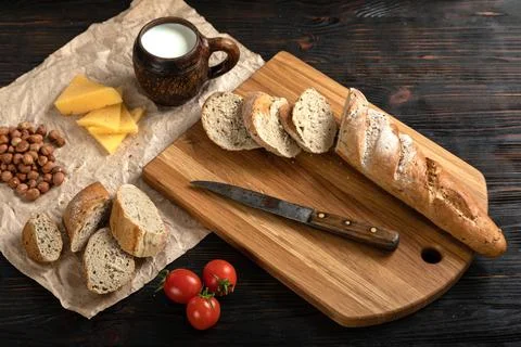 Sliced rye bread on a cutting board Stock Photos