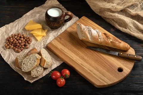 Sliced rye bread on a cutting board Stock Photos