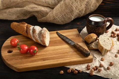 Sliced rye bread on a cutting board Stock Photos
