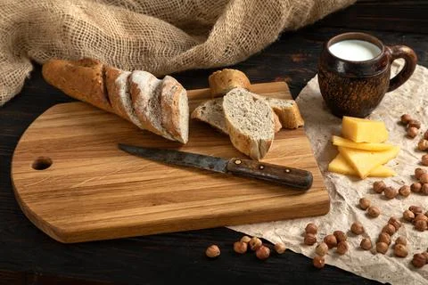 Sliced rye bread on a cutting board Stock Photos