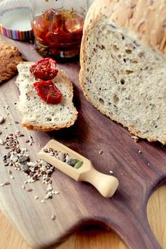 Sliced rye bread on cutting board. Whole grain rye bread with seeds. loaf of  Stock Photos