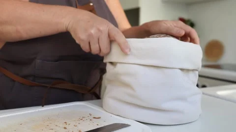 Sliced rye bread in fabric bread box Stock Footage 251664431