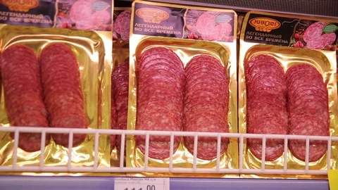 Sliced sausage in a vacuum package in a storefront Stock Footage 75488754