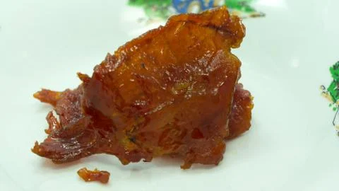 Sliced sheets of dried and crispy pork Stock Photos