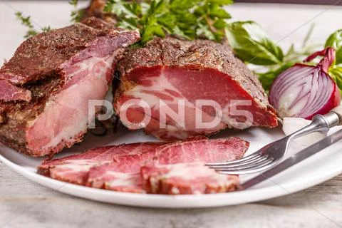 Sliced smoked pork meat Stock Photos