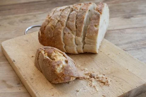 Sliced sourdough bread on cutting board Stock Photos