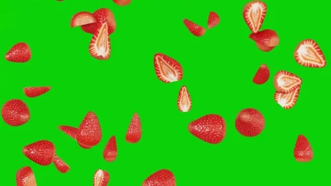Sliced strawberries falling down on a green screen Video stock 331766286