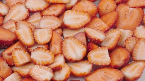 Sliced strawberries Video stock 131205110