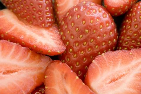 Sliced strawberries Stock Photos