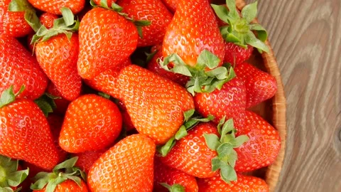 Sliced strawberries on a plate. Stock Footage 251414509