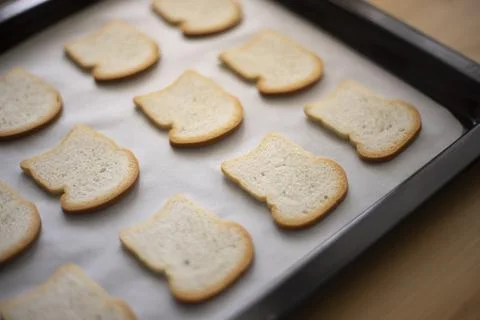 Sliced toast bread preparing on oven tray Stock Photos